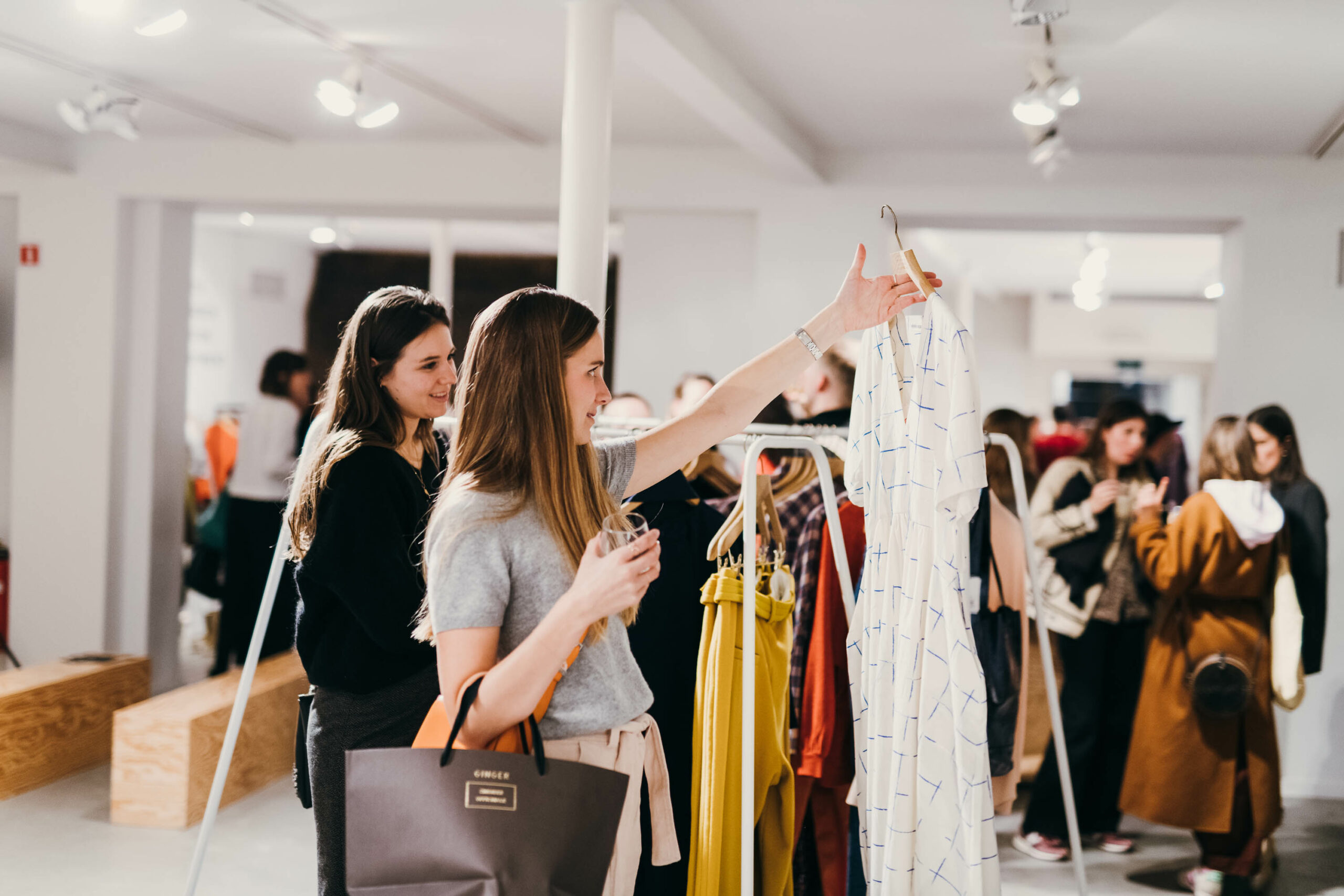 women shopping second-hand fashion